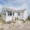 Cosy seafront chalet hits market in Norfolk for just £10,000 - but can you spot the catch?