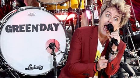 Billie Joe Armstrong throws Green Day fan off stage for playing Oasis hit