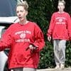 Katherine Ryan, 41, covers her growing baby bump in an oversized jumper as she's seen for the first time since revealing she's pregnant with her fourth child