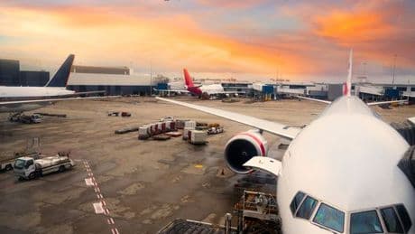 Woman rushed to hospital after falling from aerobridge at Sydney Airport