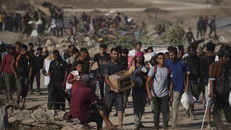 Israel's leaders slam a news report on a Gaza 'killing field' near food sites