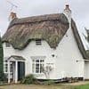 Villagers' fury as beautiful 17th-century thatched cottage is mysteriously torn down in one hour without planning permission