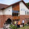 Men charged after women die following care home crash