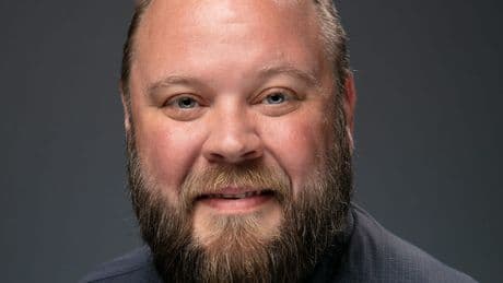 I'm 49 years old and was laid off from my six-figure sales job. I now make $52,000 in an entry-level role where I work alongside college grads.