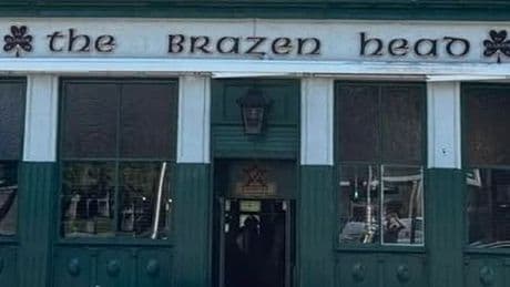 Famous Celtic pub in Glasgow unfurls 8 word banner above entrance in tribute to the champions