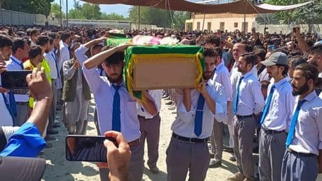 Massive mudslide kills 7 volunteers repairing flood damage in northern Pakistan
