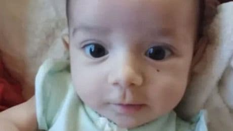 Four-month-old baby girl found dead inside hotel cupboard drawer as dad smirks in mugshot