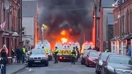 Riot police sent into Belfast: Petrol bombs thrown after sex crime vigil turned violent