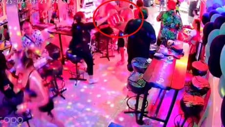 Moment swaggering tourist ‘grabs bar worker & hoists her over his head’ before he was knocked out by bouncer in Thailand