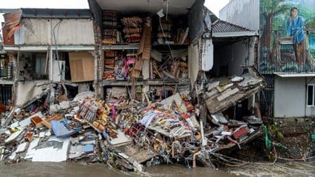 Six dead as floods wreak havoc for tourists in Bali and airport is inundated