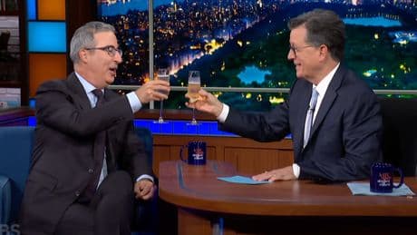 Stephen Colbert and John Oliver toast late-night shows ‘while supplies last’
