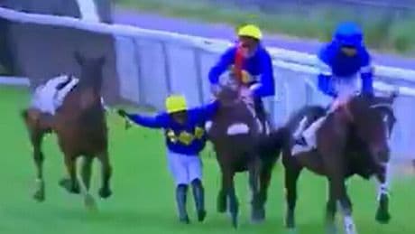 French horse racing jockey 'hangs on for dear life' in incredible incident at Auteuil