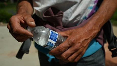 An Arizona man is handing out bottled water to neighbors in extreme heat. His HOA is fining him $100 every time