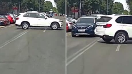 La irresponsable maniobra de un todoterreno en las narices de un coche de la Policía en medio de una calle de Madrid: “No todos los BMW pero siempre un BMW”