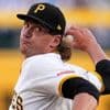 Taillon shines, Busch and Crow-Armstrong homer as Cubs beat Pirates 4-0 to close on playoffs berth