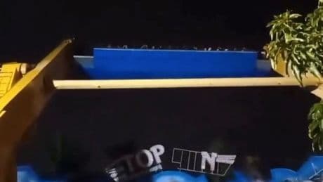 Thrill-seekers stranded 50ft in air for hours as 'Top Gun' ride breaks down
