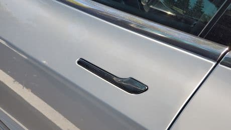 Tesla under investigation for door handles that trap people inside