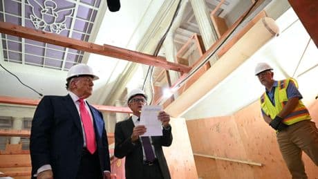 Trump tours Fed construction project, attacks Powell again