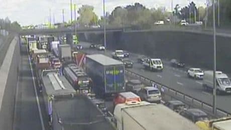 Britain’s busiest motorway is CLOSED after car catches fire in tunnel with drivers facing horrific delays