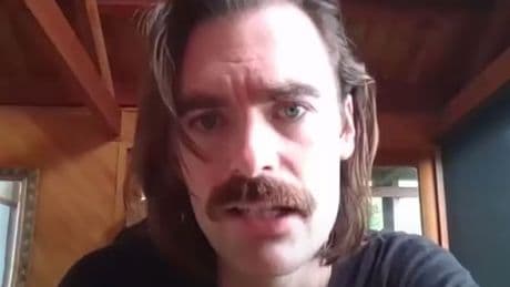 Conspiracy theorist podcaster charged with stabbing girlfriend, 30, to death