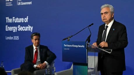 The UK says at an energy summit that green power will boost security, as the US differs