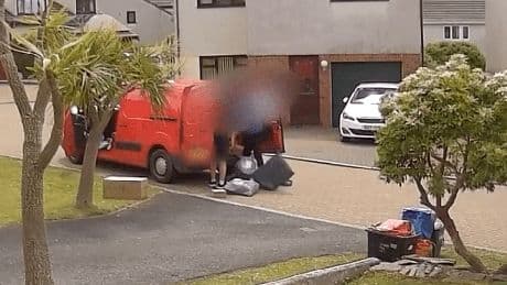 Moment brazen Evri driver flings parcels into huge pile on road before asking fuming local ‘what… are they damaged?’