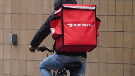 Good news, delivery drivers: DoorDash CEO says robotaxis aren't ready for food delivery