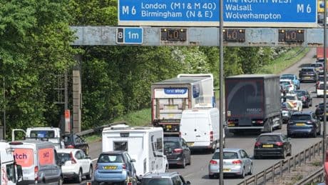 Major motorways under amber traffic warning for Bank Holiday weekend as 18m drivers to hit the roads in getaway rush