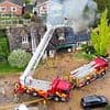 Crews battling house fire caused by LIGHTNING - after Met Office issued a tornado warning