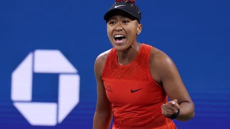 Naomi Osaka’s flower power lifts her into second round of US Open
