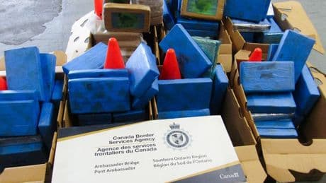 Almost $50 million in cocaine found hidden in trucks crossing into Canada from U.S., police say