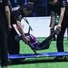 Footballers, your jobs are safe for now: Watch as China's first 3-on-3 robot football match kicks off (and ends with two bots being stretched off the pitch!)