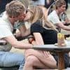 Eddie Redmayne and wife Hannah Bagshawe 'can't keep their hands off each other' as they share a passionate kiss while soaking up the sun at Glastonbury
