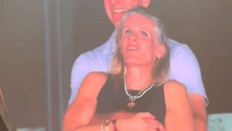 Coldplay's roving 'kiss cam' spots boss with colleague as they duck for cover