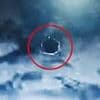 Flying saucer UFO is caught on camera by US MILITARY in newly-released footage