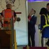 Macron says he and wife were horsing around when she appears to push the French leader