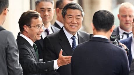 US and China officials meet in Stockholm to discuss how to ease trade tensions