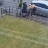 Moment car ploughs into thugs brawling on street with machetes in bizarre broad-daylight carnage