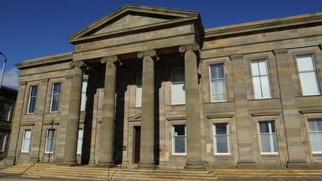 Thug hit partner's head off wall and battered her with bottle
