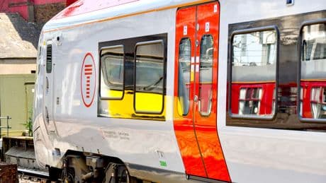 Six injured after train hits tractor at level crossing