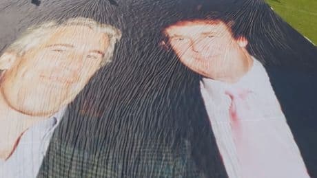 Huge Trump and Epstein photograph unveiled outside Windsor Castle ahead of US president’s state visit