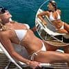 Amanda Holden shows off her sizzling figure in a skimpy white bikini as she twins with lookalike glam daughter Lexi Hughes in Greece