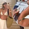 Rosie Huntington-Whiteley flaunts her abs in a white bikini as she enjoys a luxurious getaway in Antibes after Cannes Film Festival