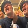 Jamie Carragher looks worse for wear as Sky Sports pundit belts out Oasis songs on the tube with fans after Wembley gig