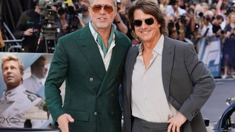 Brad Pitt embraces Tom Cruise at F1: The Movie premiere