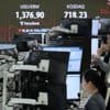 Asian shares slip as worries about U.S. debt send Wall St tumbling