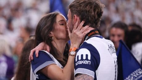 James Maddison kisses girlfriend Kennedy Alexa as Spurs stars celebrate with families on pitch after Europa League win