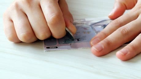 She was at home eating chocolate and listening to Pink Floyd’s Money. Then a scratcher made her a millionaire