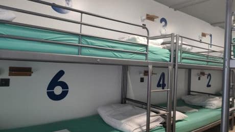 ‘Should be illegal’ – Man Utd and Spurs fans face staying in £2,000 Squid Game-like hostel for Europa League final