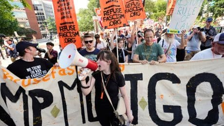 Photos of ‘Free D.C.’ protest against Trump’s federal takeover of Washington police
